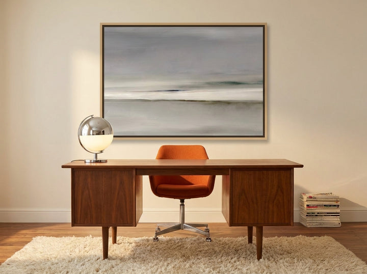 Canvas wall art with a natural timber surround styled on the wall in a retro 70s home office
