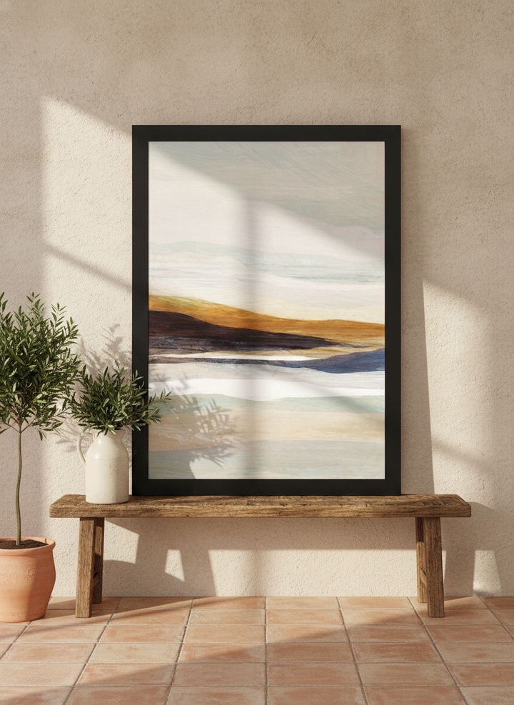 Modern wall art print standing on a bench in a Mediterranean living room