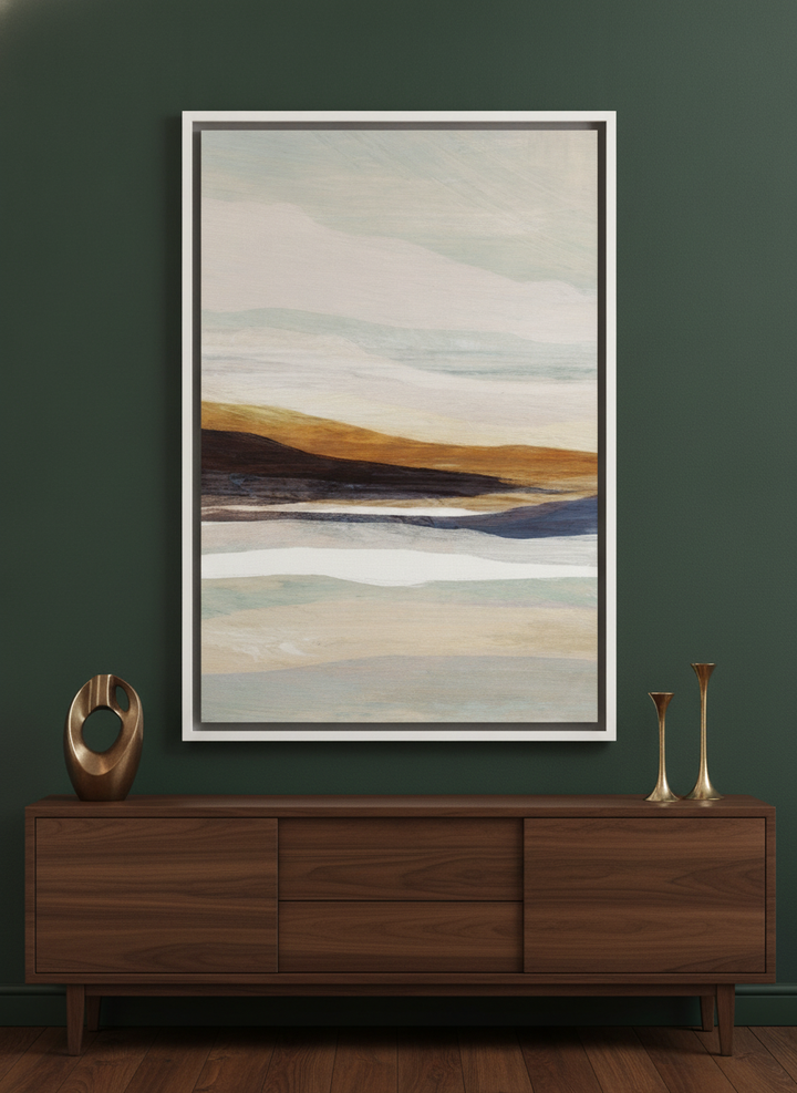 Canvas wall art with a white surround standing on a sideboard in a moody bedroom