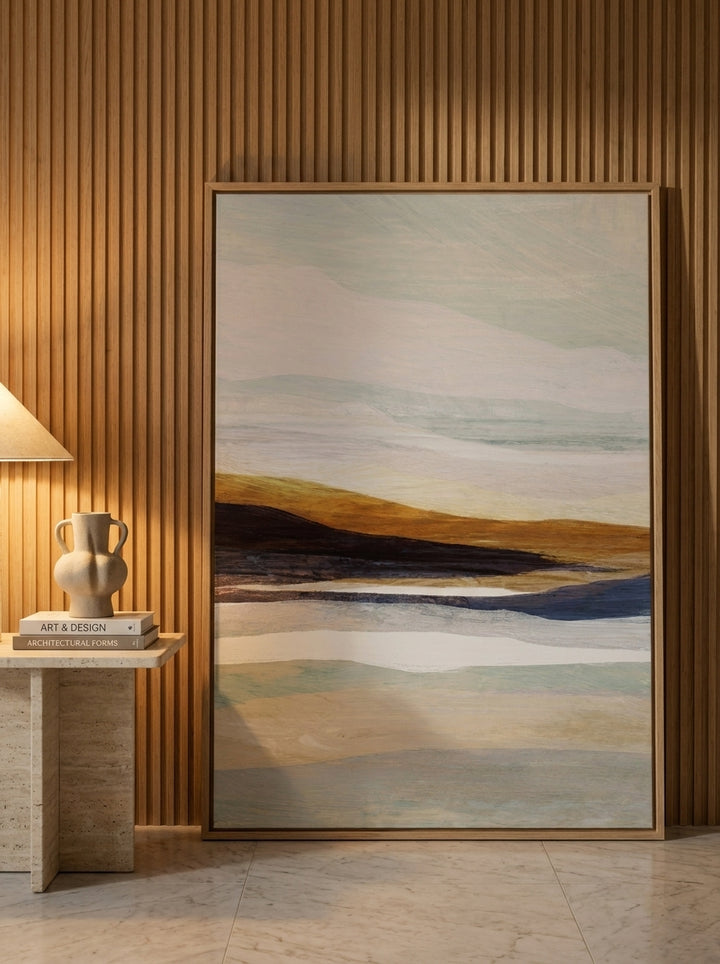 Oversized statement modern wall art print leaning against the wall in a luxe dining room