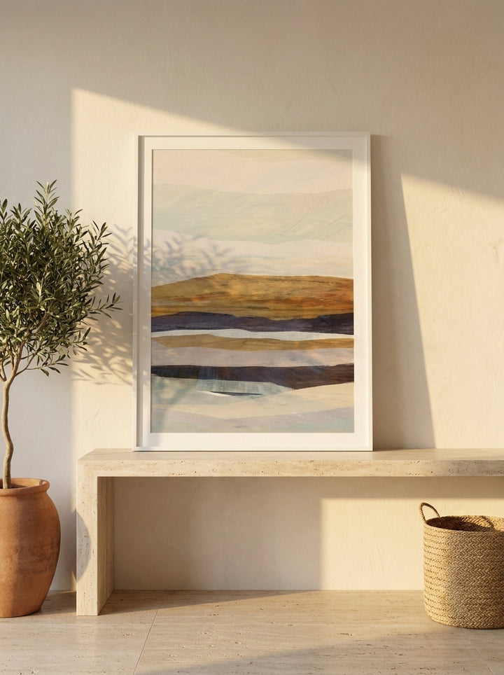 Modern wall art print standing on a console in a Mediterranean home office