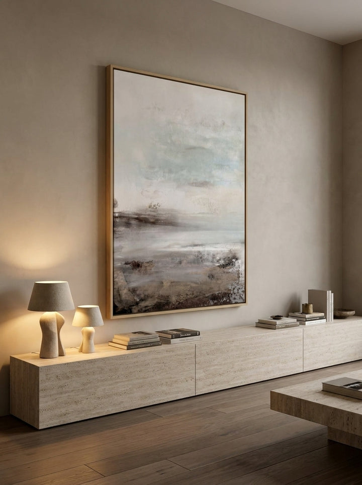 Oversized statement canvas wall art with a natural timber surround styled on the wall in a luxe living room