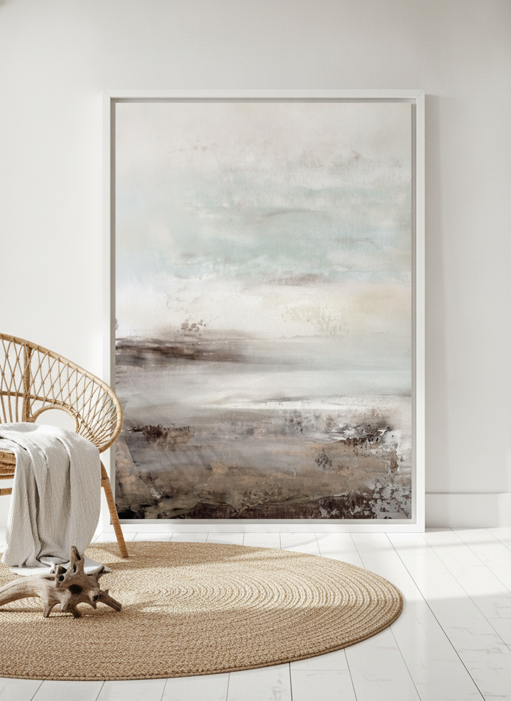 Modern wall art print leaning against the wall in a coastal home office