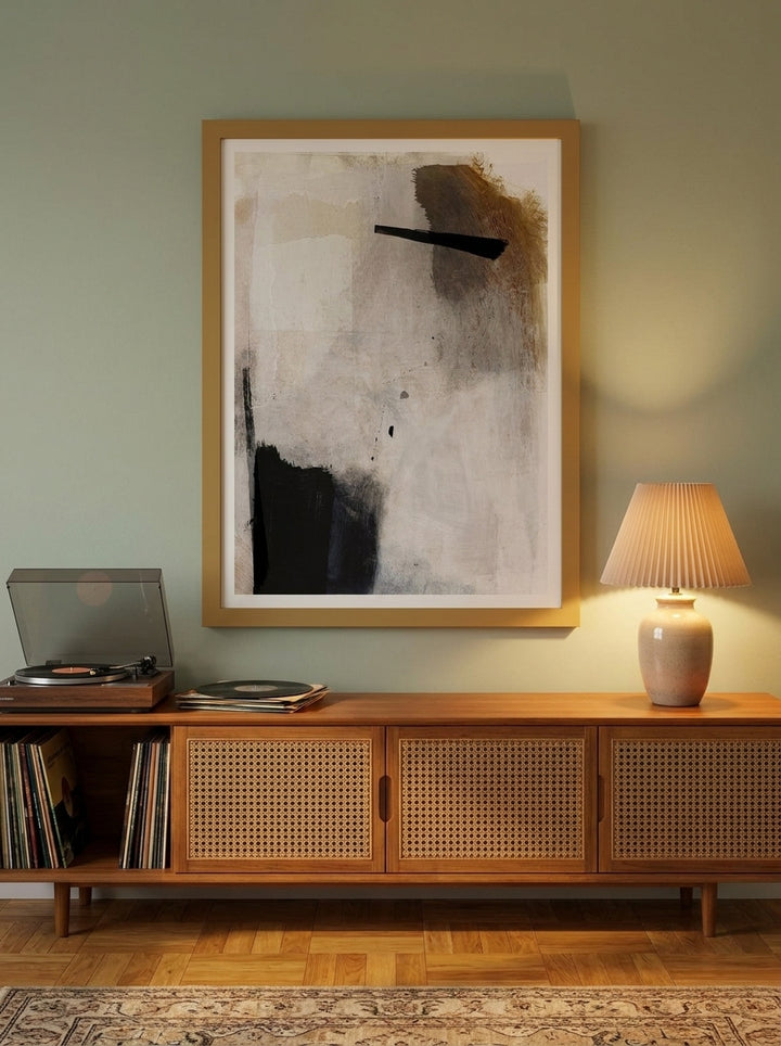 Modern wall art print styled on the wall in a mid-century living room