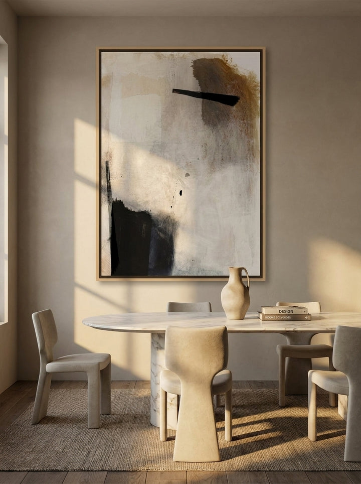 Oversized statement canvas wall art with a natural timber surround styled on the wall in a luxe dining room