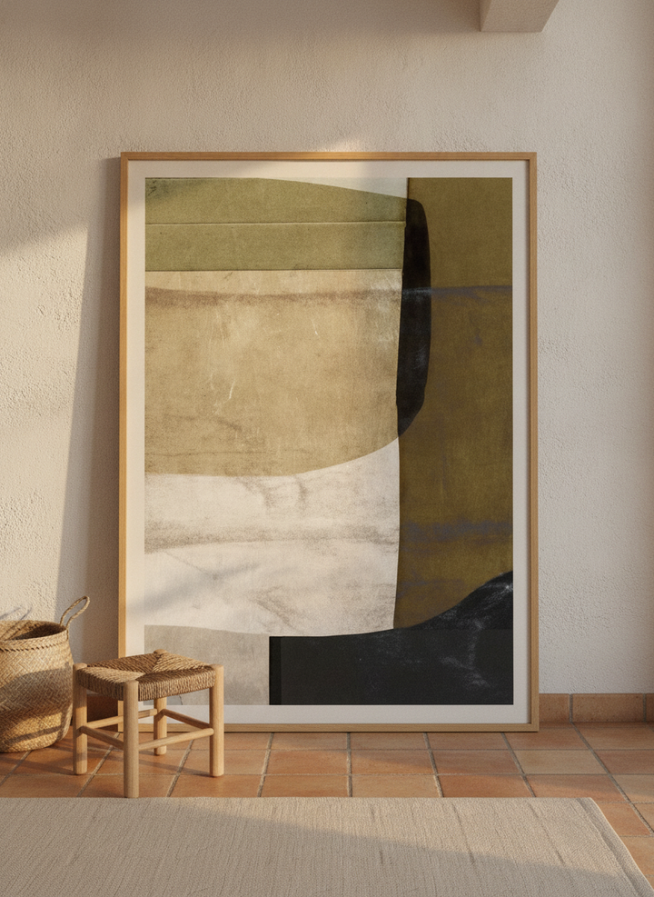 Oversized statement modern wall art print leaning against the wall in a Mediterranean dining room