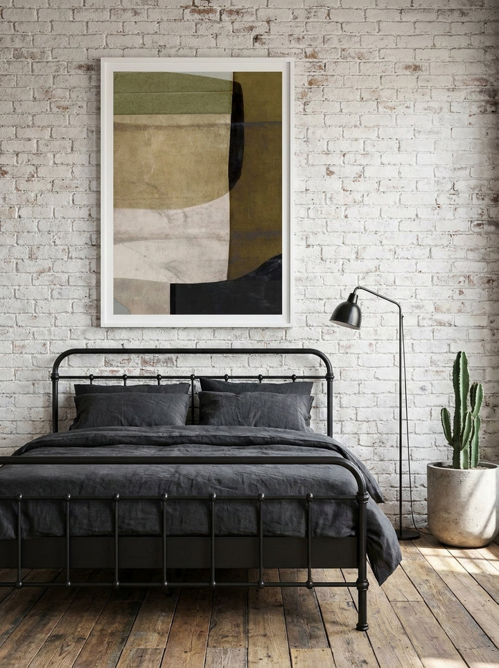 Modern wall art print styled on the wall in an industrial loft bedroom