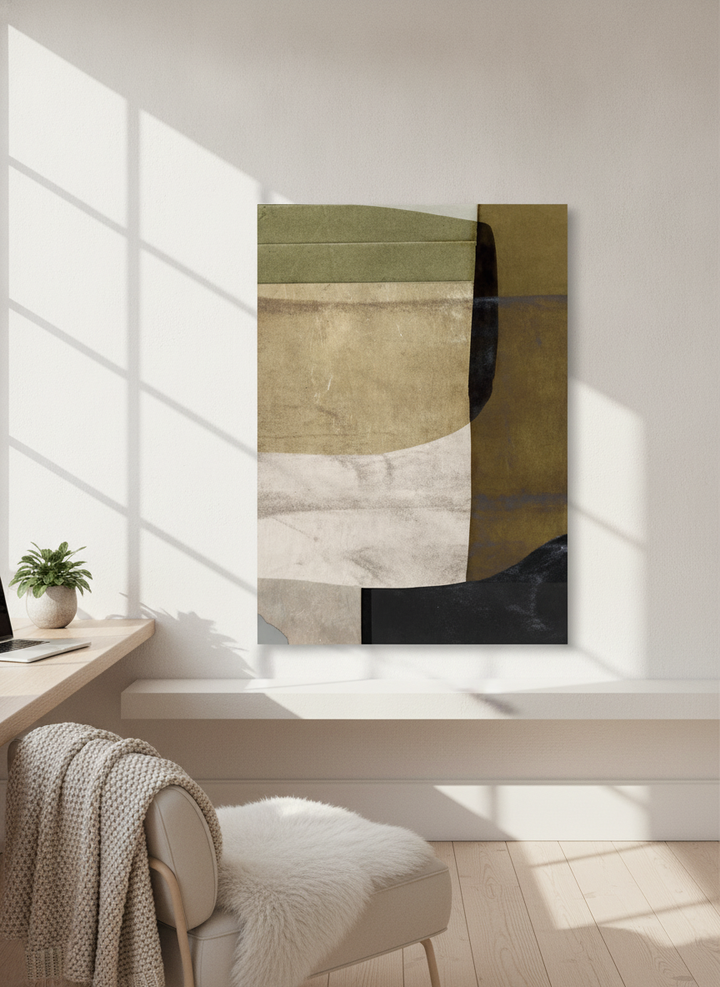 Stretched canvas wall art standing on a shelf in a bright Scandinavian home office