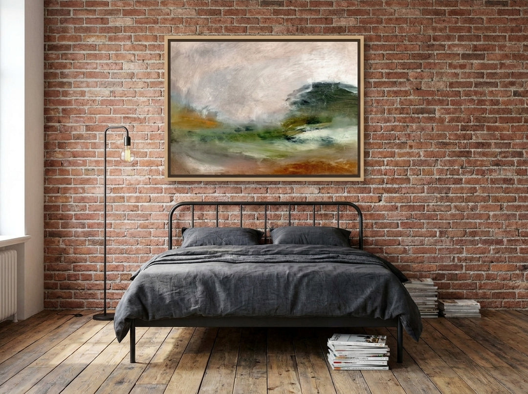 Canvas wall art with a natural timber surround styled on the wall in an industrial loft bedroom