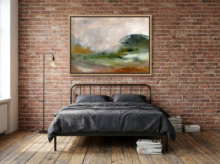 Canvas wall art with a natural timber surround styled on the wall in an industrial loft bedroom