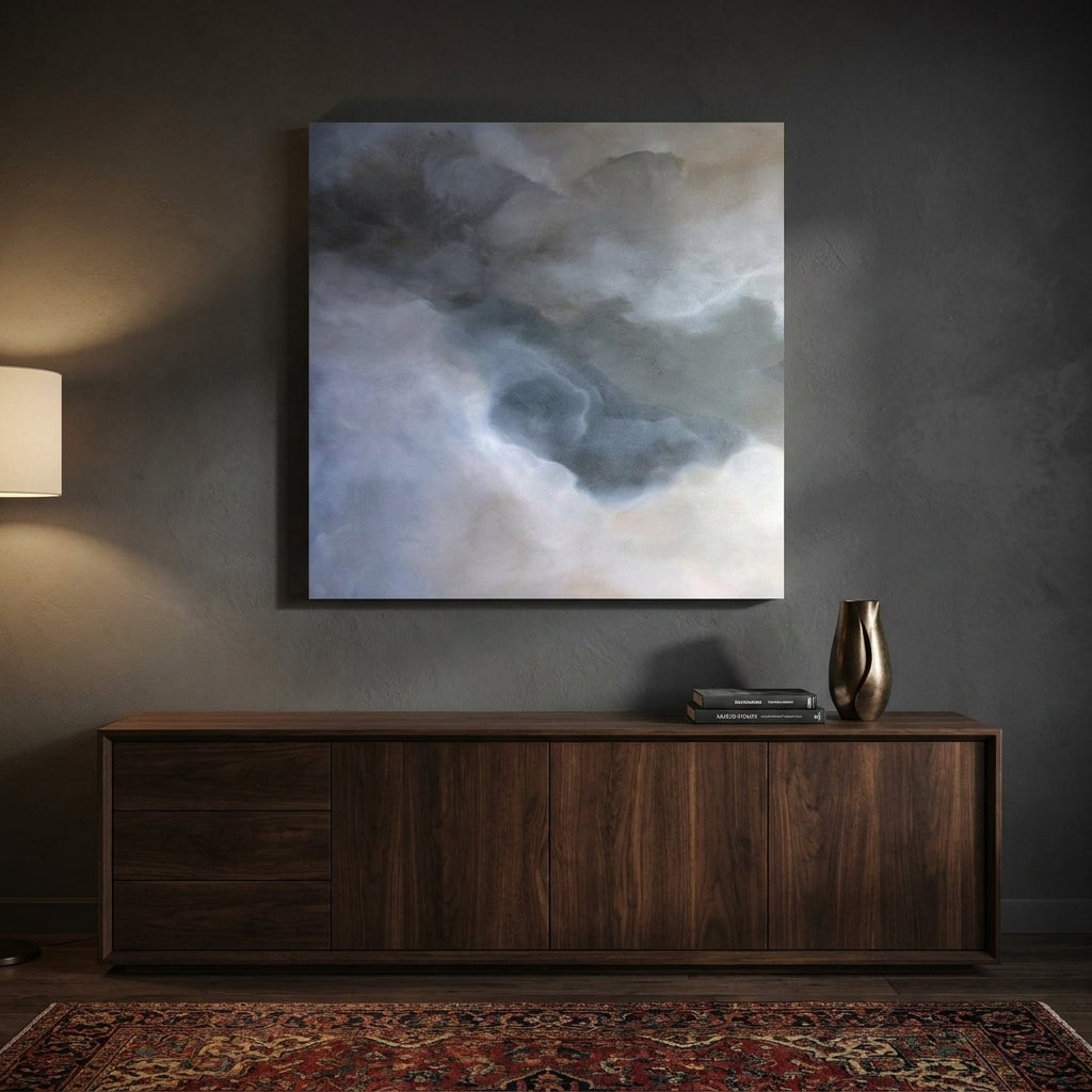 Stretched canvas wall art styled on the wall in a moody living room
