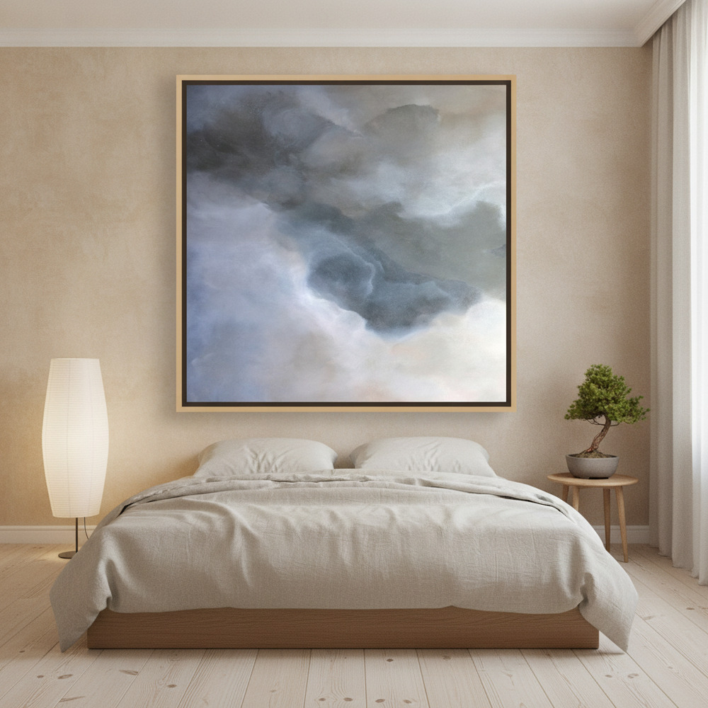 Oversized statement canvas wall art with a natural timber surround styled on the wall in a warm Japandi bedroom