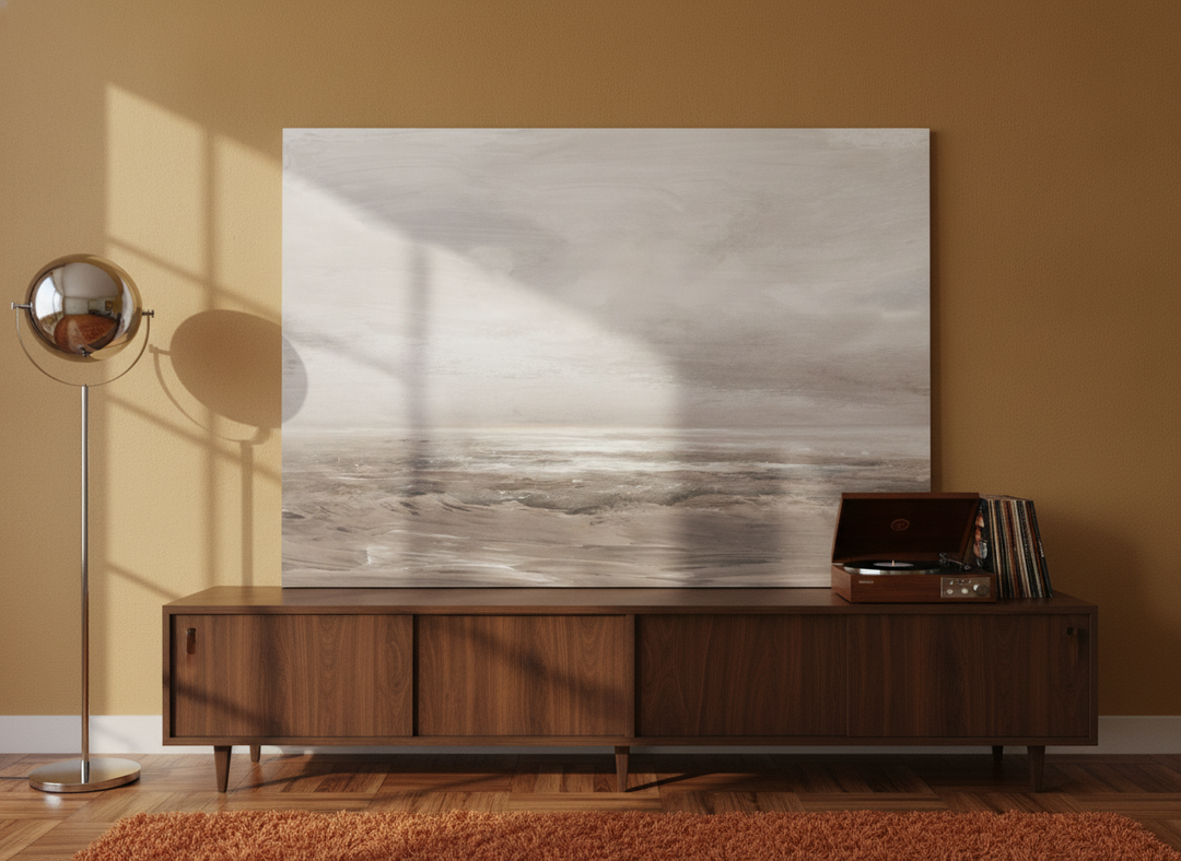 Stretched canvas wall art standing on a sideboard in a retro 70s bedroom