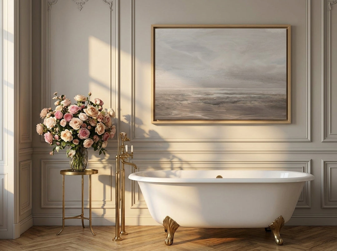 Canvas wall art with a natural timber surround styled on the wall in a Parisian bathroom