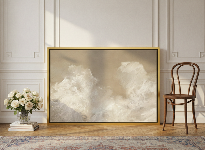 Canvas wall art with a gold leaf surround leaning against the wall in a Parisian home office