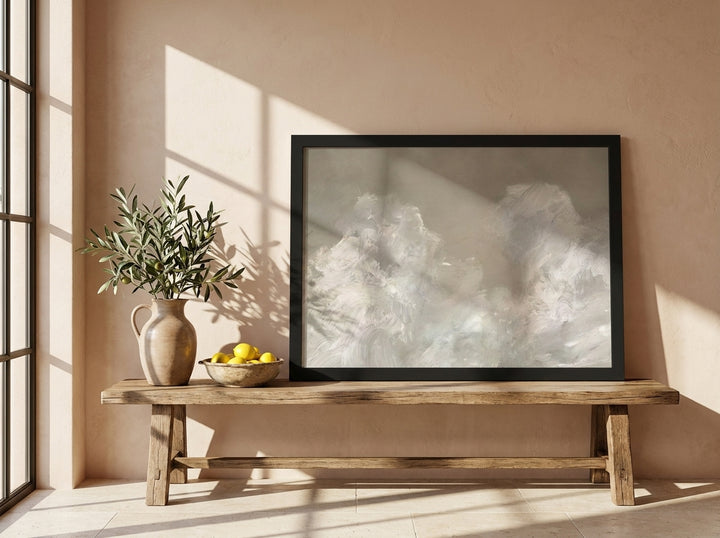 Modern wall art print standing on a bench in a Mediterranean living room