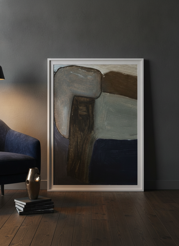 Modern wall art print leaning against the wall in a moody bedroom