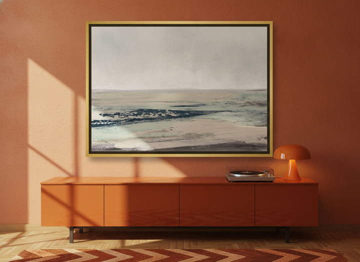 Canvas wall art with a gold leaf surround styled on the wall in a retro 70s living room