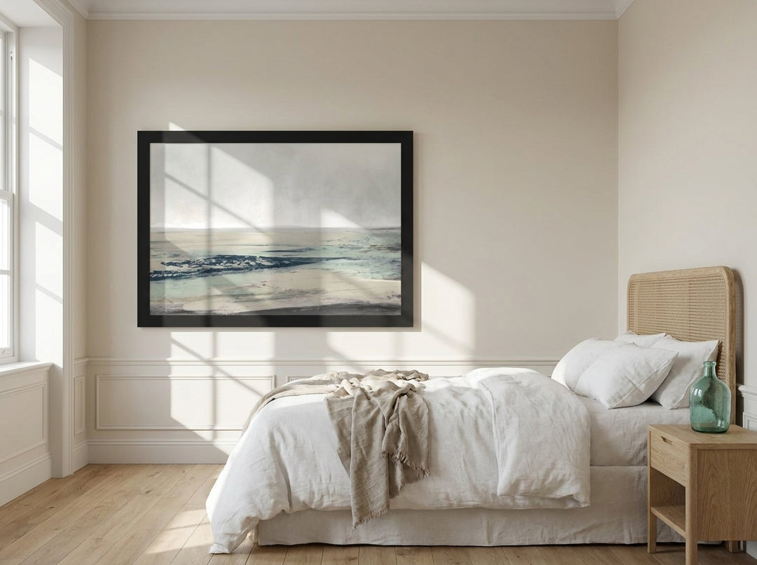 Oversized statement modern wall art print styled on the wall in a coastal bedroom