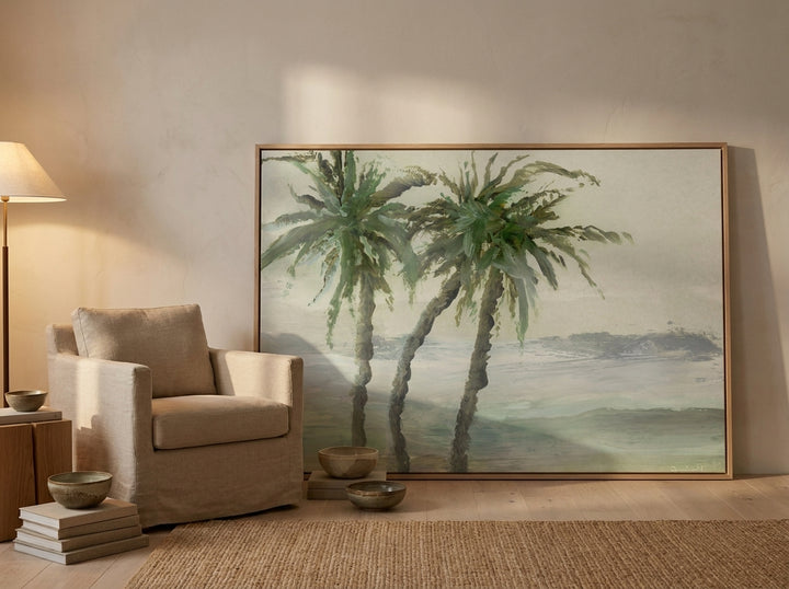 Oversized statement modern wall art print leaning against the wall in a warm Japandi dining room