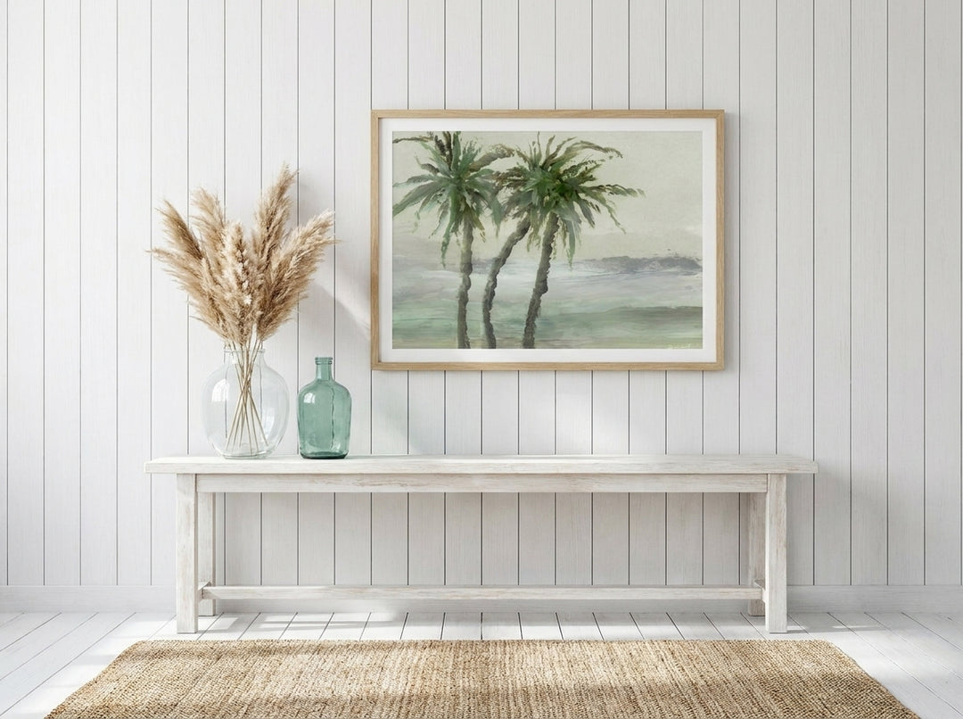 Modern wall art print styled on the wall in a coastal living room