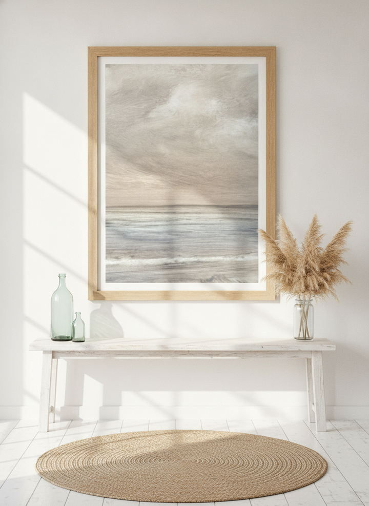 Modern wall art print styled on the wall in a coastal living room