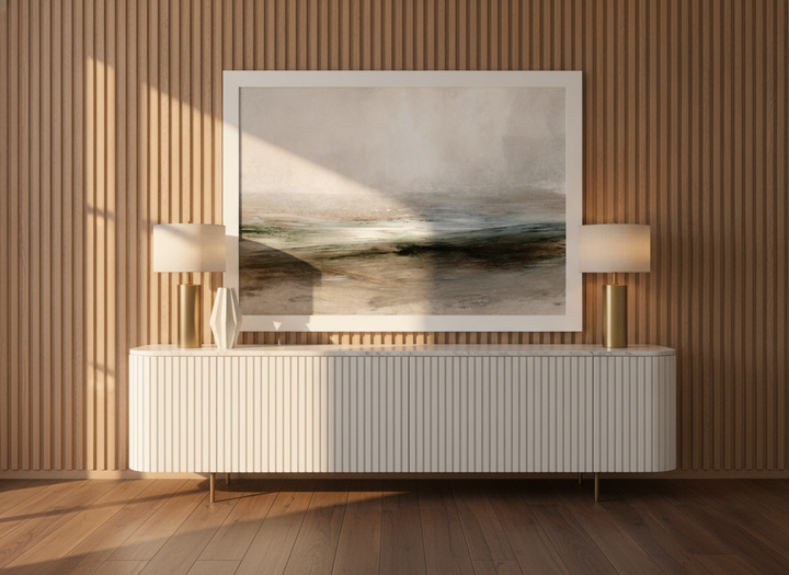 Modern wall art print standing on a sideboard in a luxe bedroom