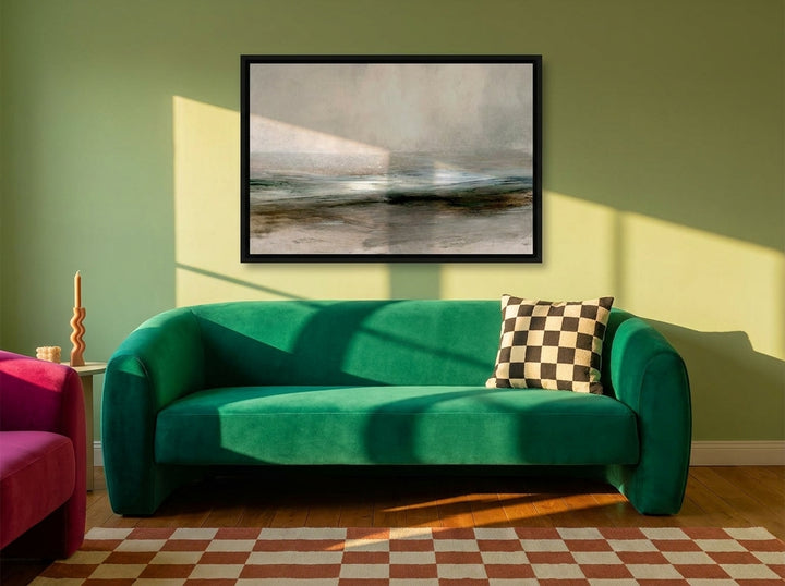 Canvas wall art with a black surround styled on the wall in a colourful eclectic living room