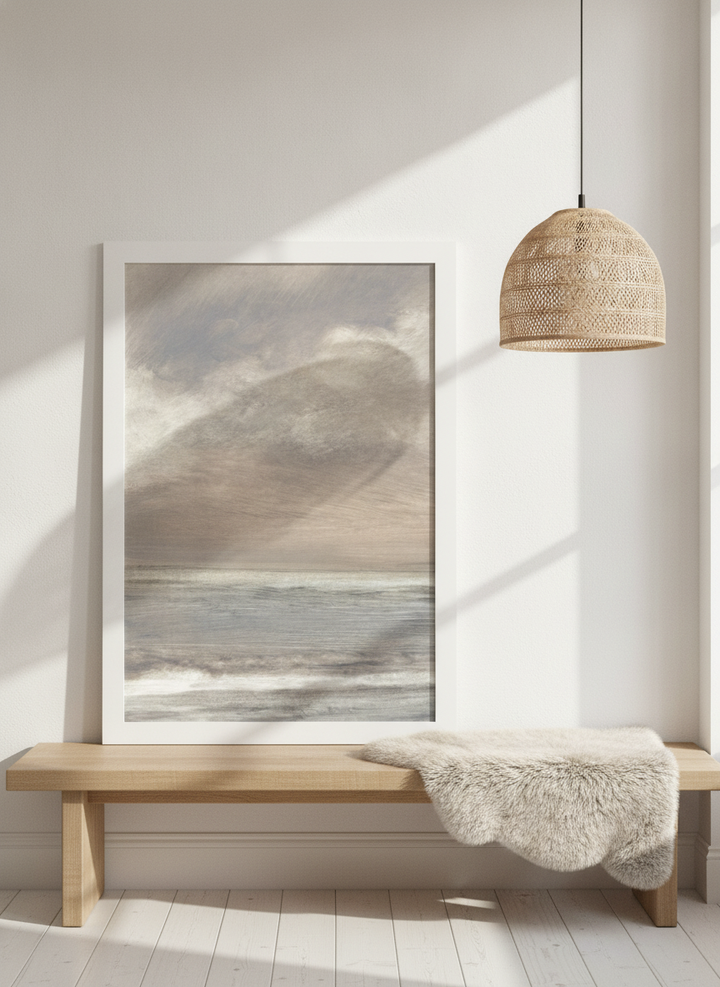 Modern wall art print standing on a bench in a bright Scandinavian home office