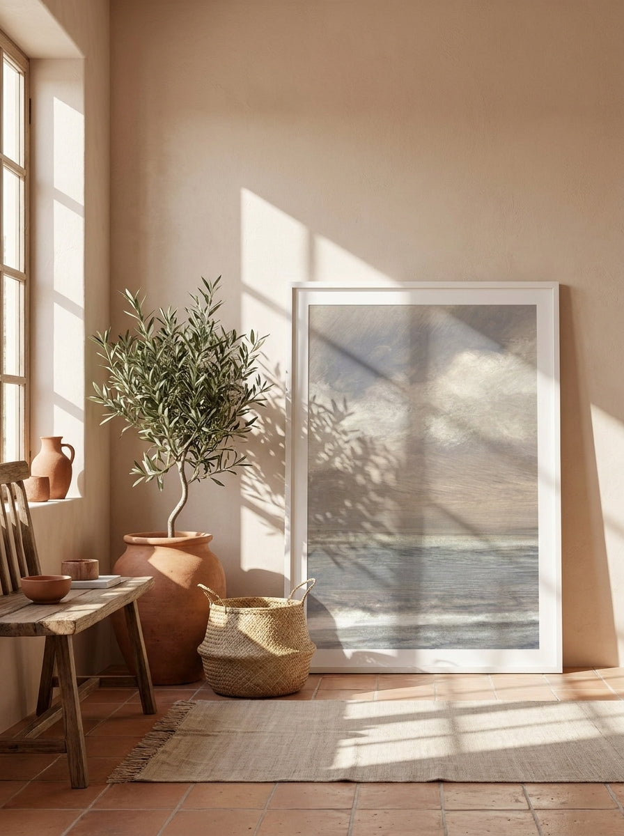 Modern wall art print leaning against the wall in a Mediterranean bedroom