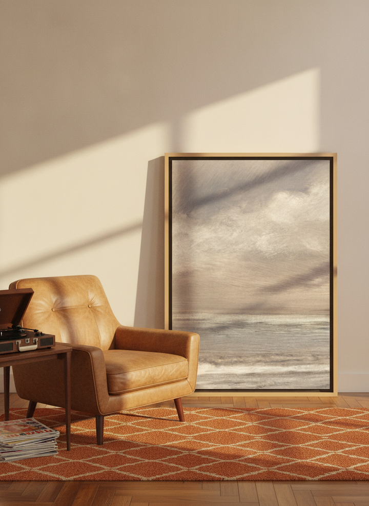 Canvas wall art with a natural timber surround leaning against the wall in a retro 70s home office
