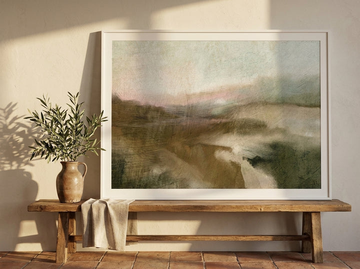 Modern wall art print standing on a bench in a Mediterranean home office
