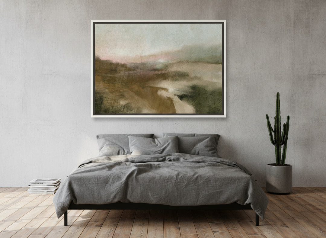 Canvas wall art with a white surround styled on the wall in an industrial loft bedroom