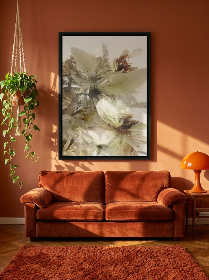 Canvas wall art with a black surround styled on the wall in a retro 70s living room
