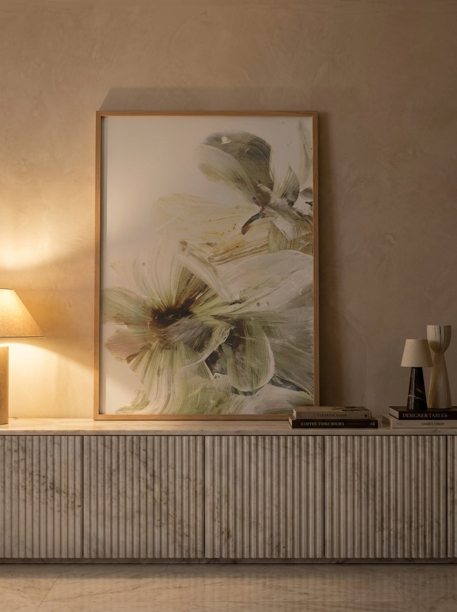 Modern wall art print standing on a sideboard in a luxe bedroom