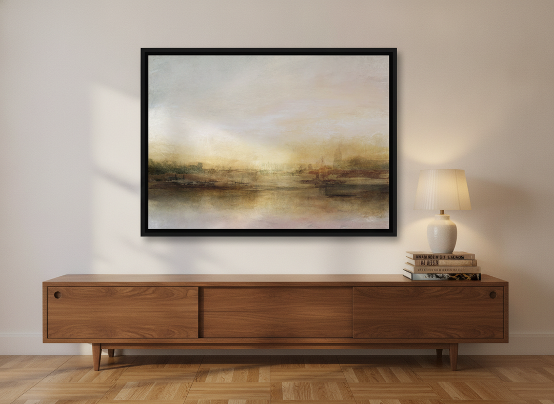Canvas wall art with a black surround standing on a sideboard in a mid-century home office