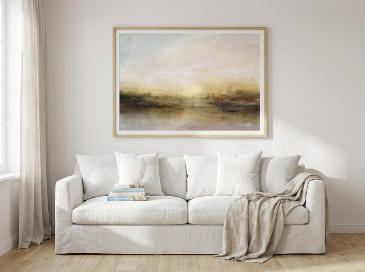 Modern wall art print styled on the wall in a coastal living room
