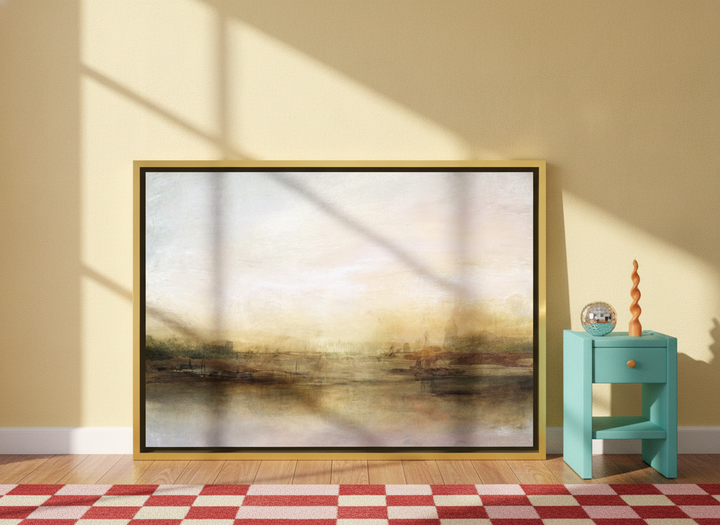 Canvas wall art with a gold leaf surround leaning against the wall in a colourful eclectic dining room