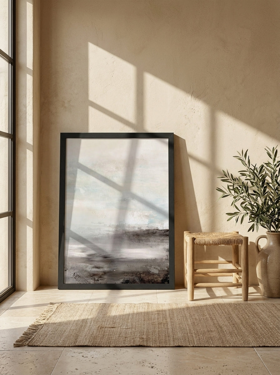 Modern wall art print leaning against the wall in a Mediterranean living room