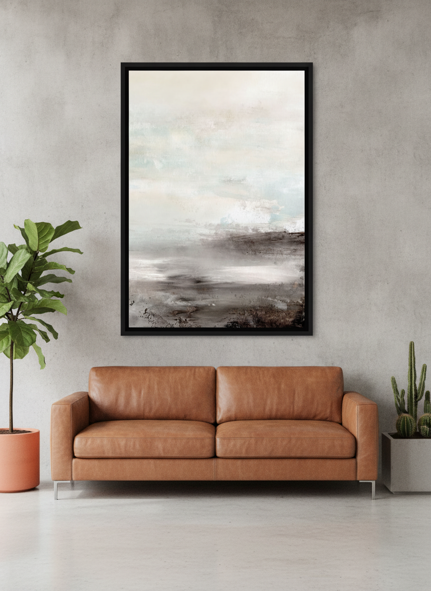 Canvas wall art with a black surround styled on the wall in an industrial loft living room