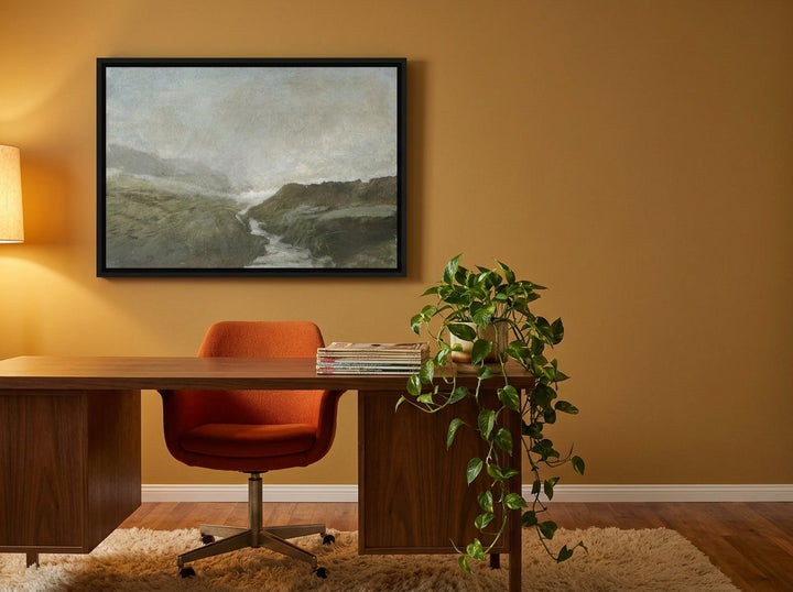 Canvas wall art with a black surround styled on the wall in a retro 70s home office