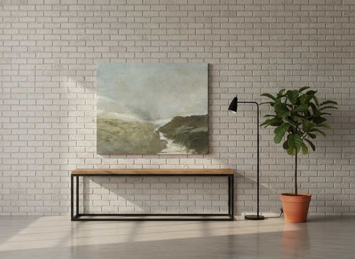 Stretched canvas wall art standing on a console in an industrial loft living room
