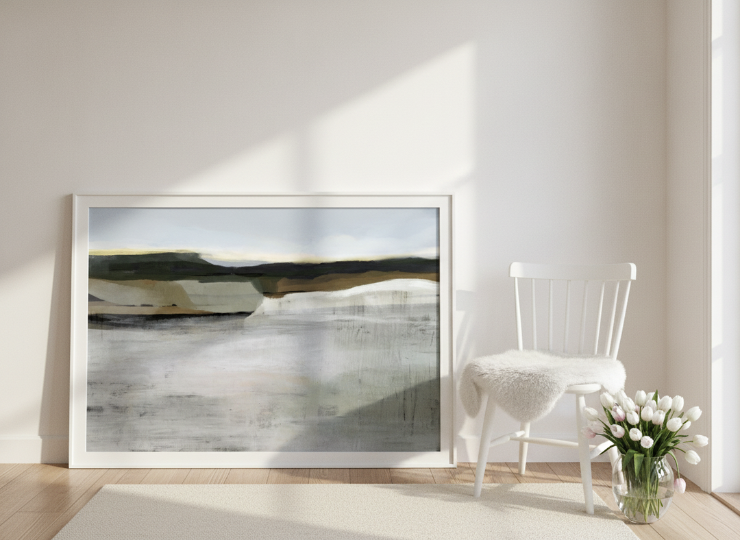 Modern wall art print leaning against the wall in a bright Scandinavian home office