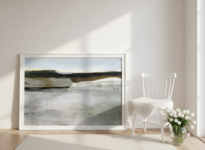 Modern wall art print leaning against the wall in a bright Scandinavian home office