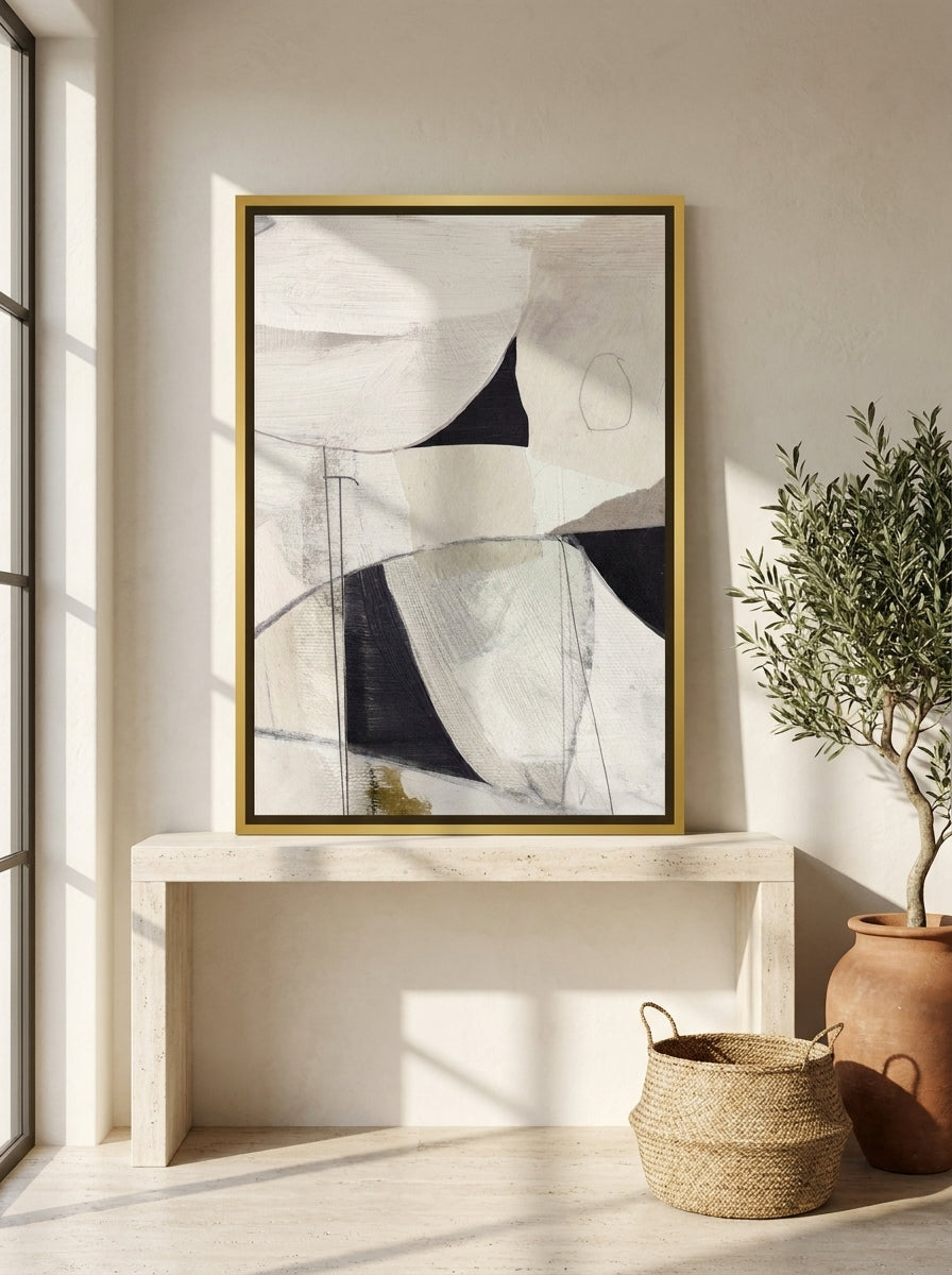 Canvas wall art with a gold leaf surround standing on a console in a Mediterranean bedroom