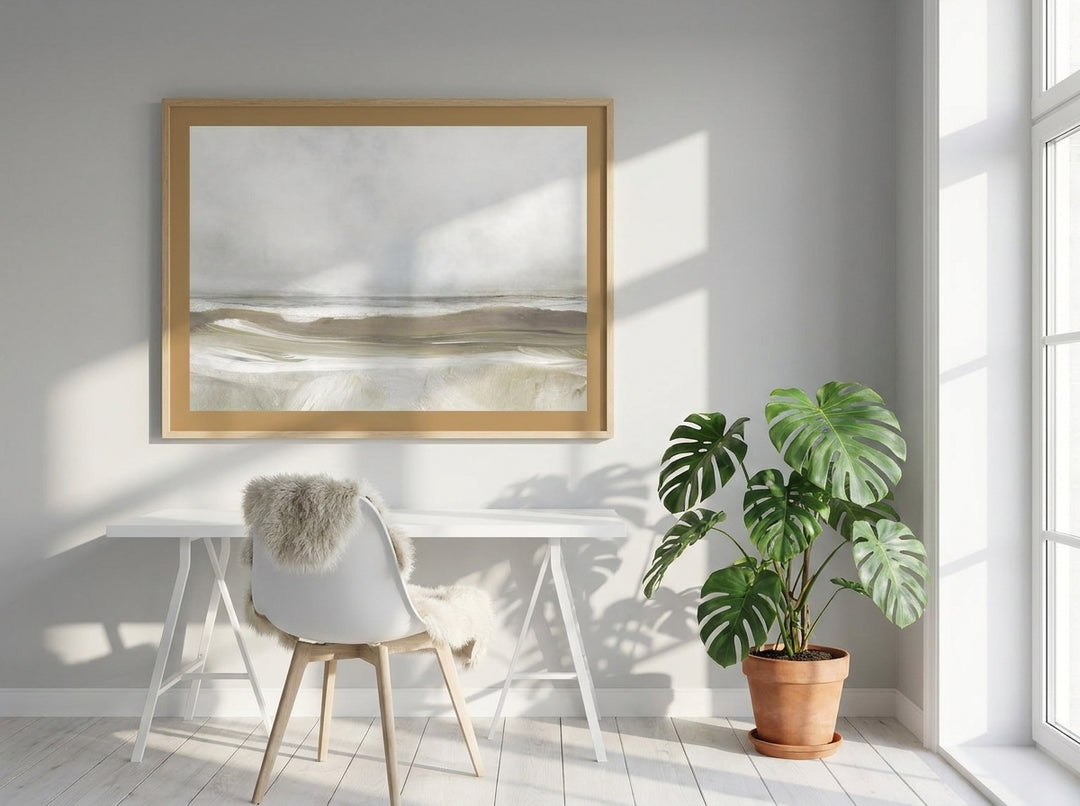 Modern wall art print styled on the wall in a bright Scandinavian home office