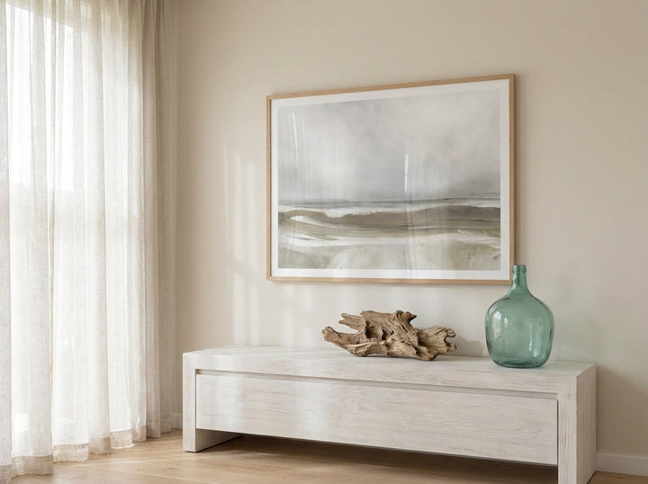 Modern wall art print styled on the wall in a coastal living room