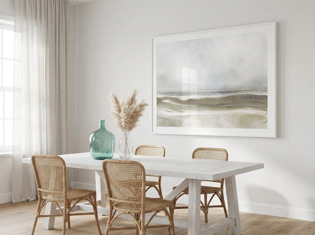 Oversized statement modern wall art print styled on the wall in a coastal dining room