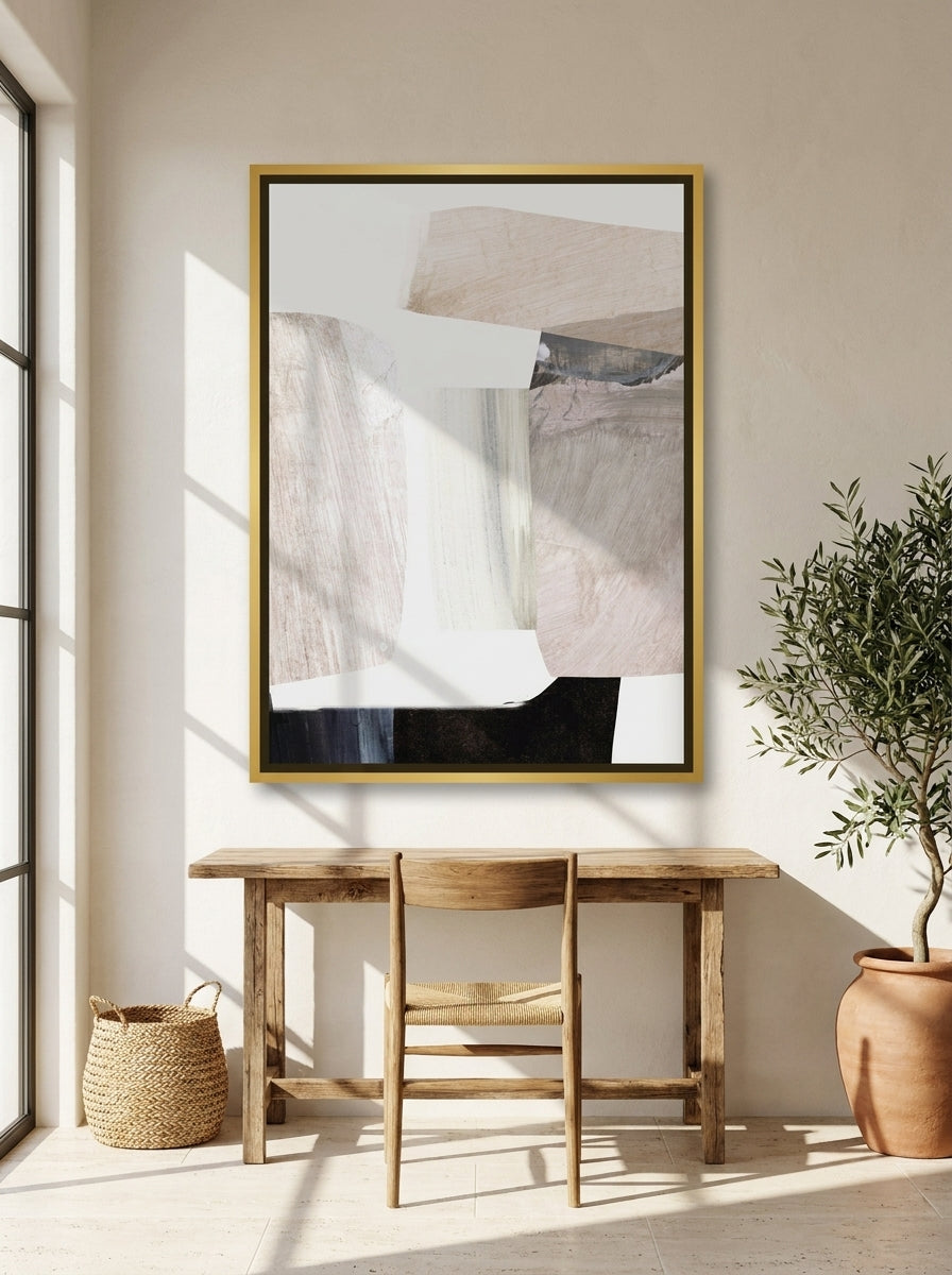 Canvas wall art with a gold leaf surround styled on the wall in a Mediterranean home office