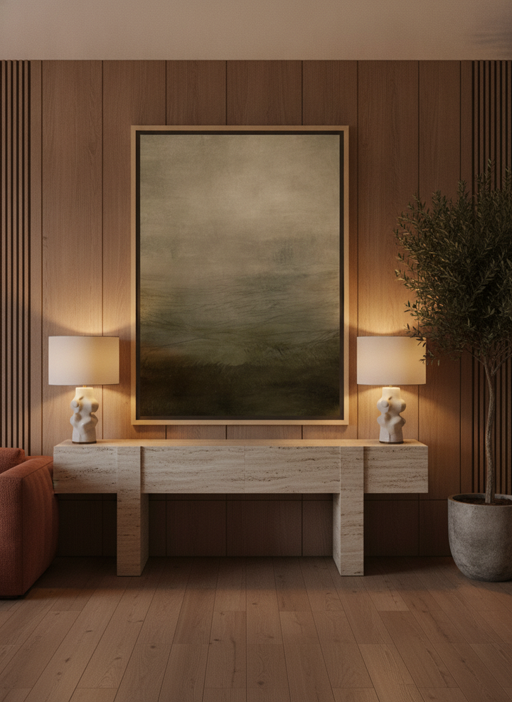 Oversized statement canvas wall art with a natural timber surround styled on the wall in a luxe living room